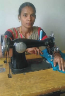 New entrepreneur Saranya, trained to be a tailor by Reaching the Unreached, sewing at her machine